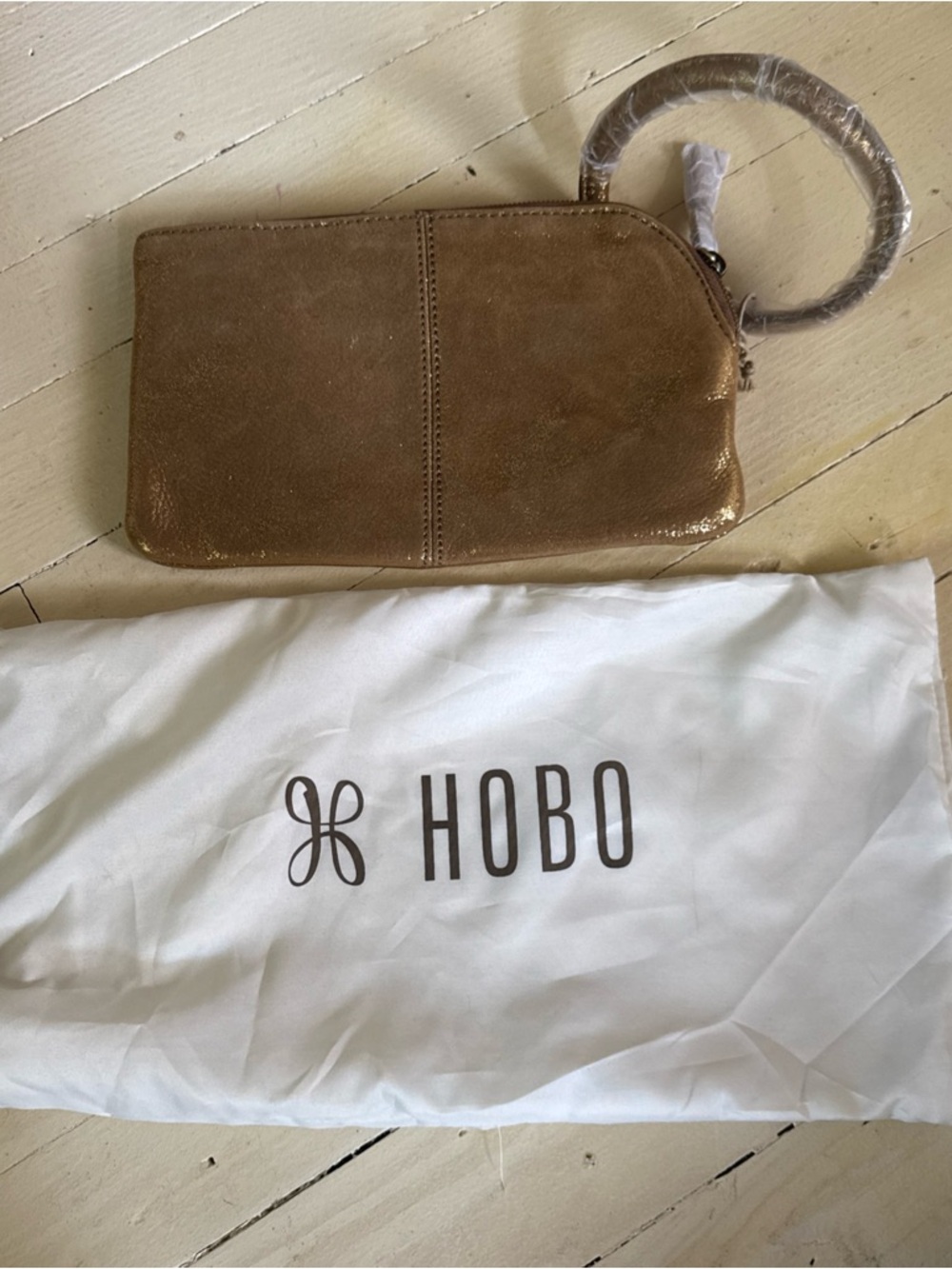 HOBO Metallic Silver-Tan Leather Wristlet with Ring Handle